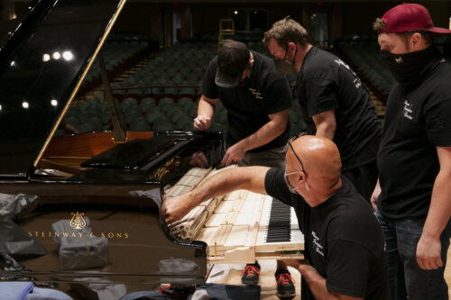 Photograph of unboxing the new piano