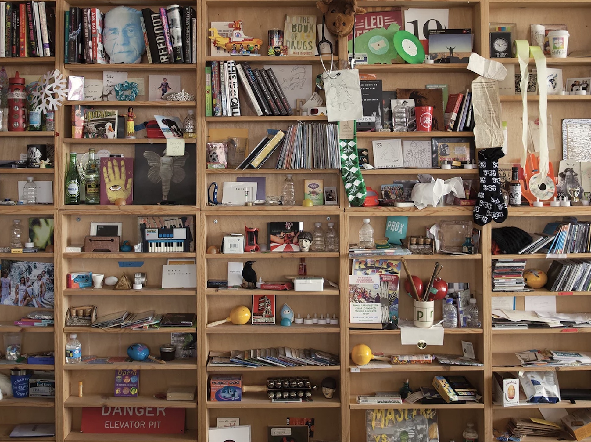 The bric-a-brac-stacked shelves of the Tiny Desk. NPR