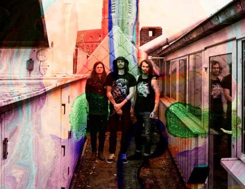 All Them Witches posing in an alleyway